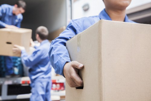 Student removals team loading boxes in Sydenham