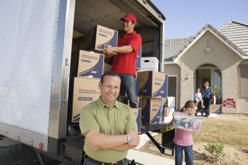 Packed apartment belongings ready for local removals service in Sydenham
