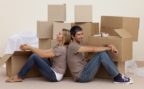 Packed boxes and furniture ready for transport